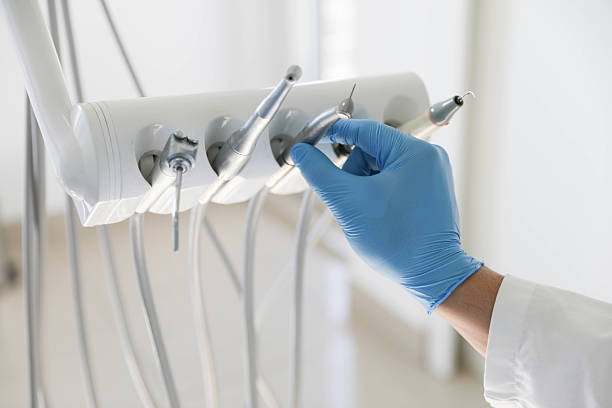 Professional Tooth Extraction technician working in McConnell AFB, KS